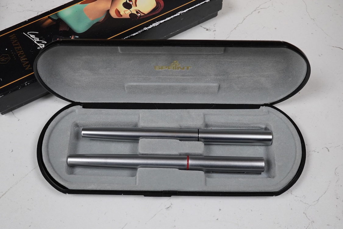 A quantity of boxed fountain pens and ballpens